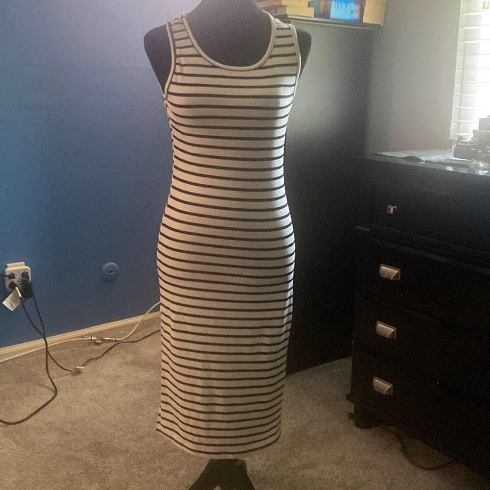 Black and white striped,  form fitting dress